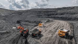 Open-pit mine with haul trucks and excavators